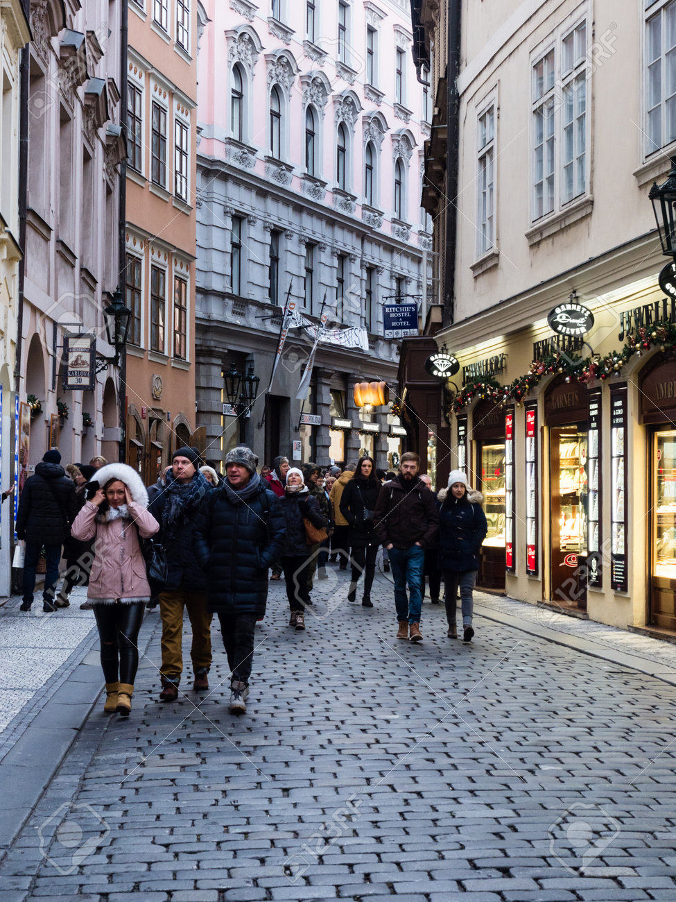 Prague, Czech Republic - December 12, 2018: Tourists Walking On A Busy  Shopping Street In Historic Prague Old Town Stock Photo, Picture and  Royalty Free Image. Image 140143238.