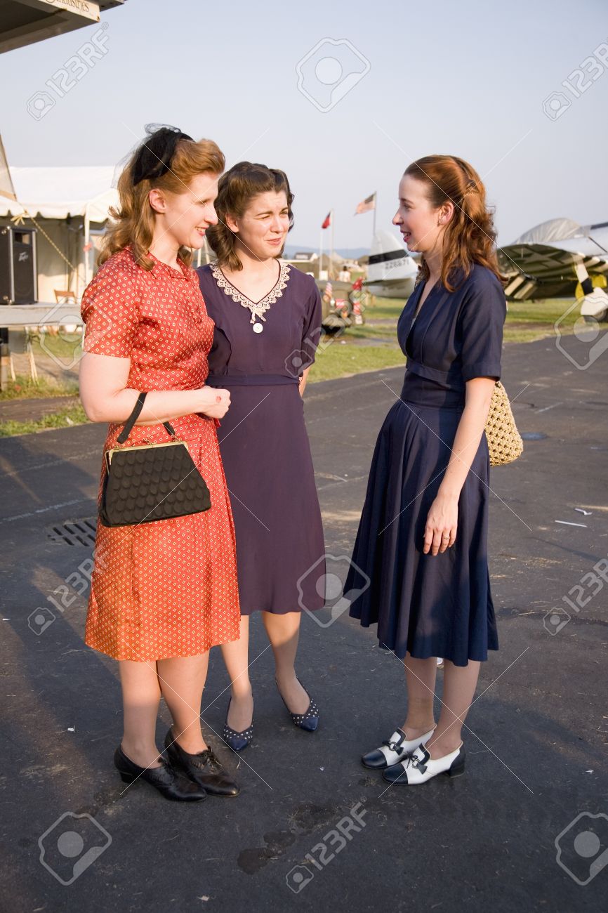 three women wearing old fashioned 1940s dresses at mid atlantic