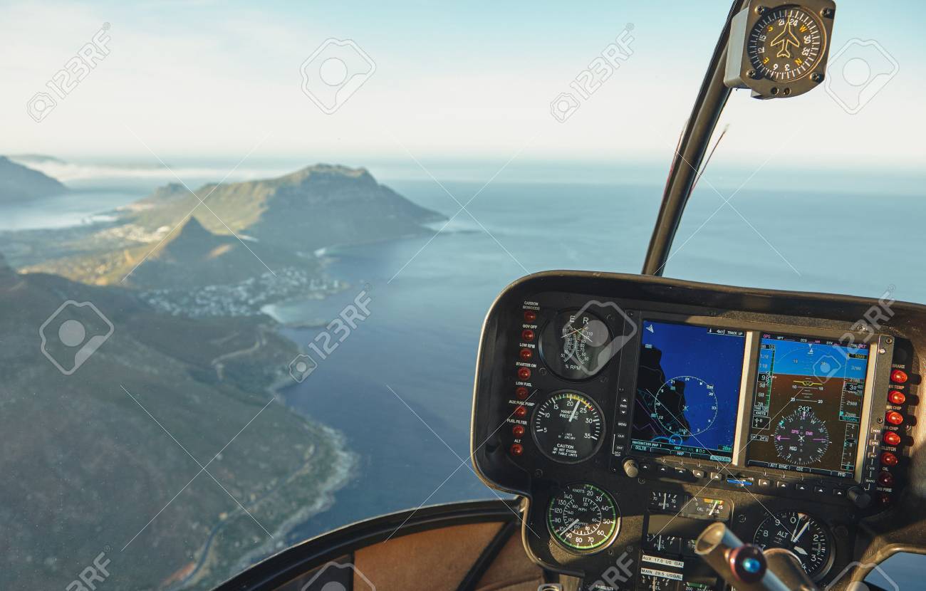 Vue Aérienne D\'un Poste De Pilotage D\'hélicoptère Survolant La Ville ... Vue Aérienne D\'un Poste De Pilotage D\'hélicoptère Survolant La Ville ...