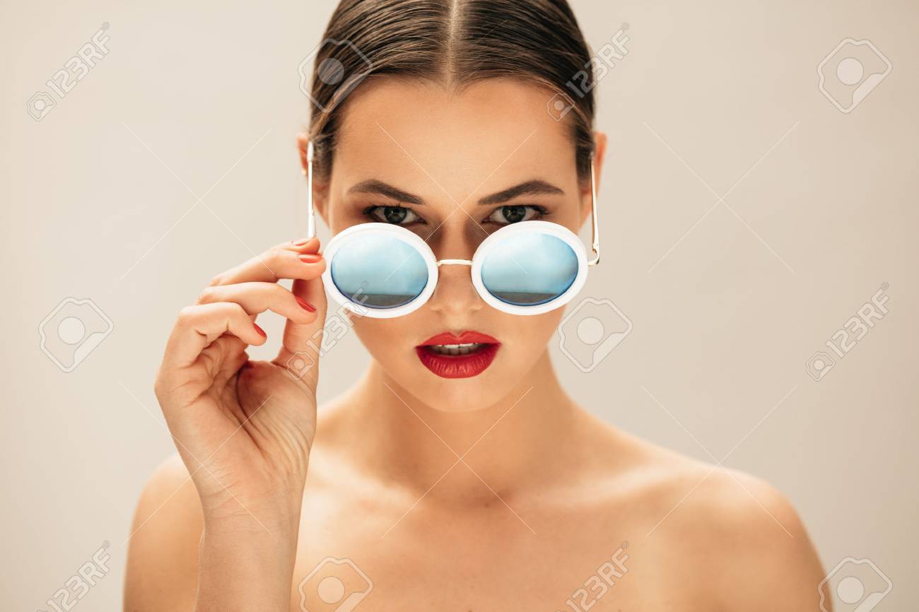 Portrait Of Fashion Woman Peeking Over Sunglasses Female Fashion Stock Photo Picture And Royalty Free Image Image Portrait Of Fashion Woman Peeking Over Sunglasses Female Fashion Stock Photo Picture And Royalty Free Image Image