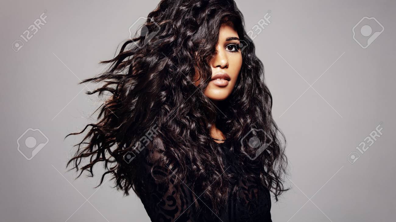 Beautiful Brunette Woman With Long Curly Hair Female Fashion