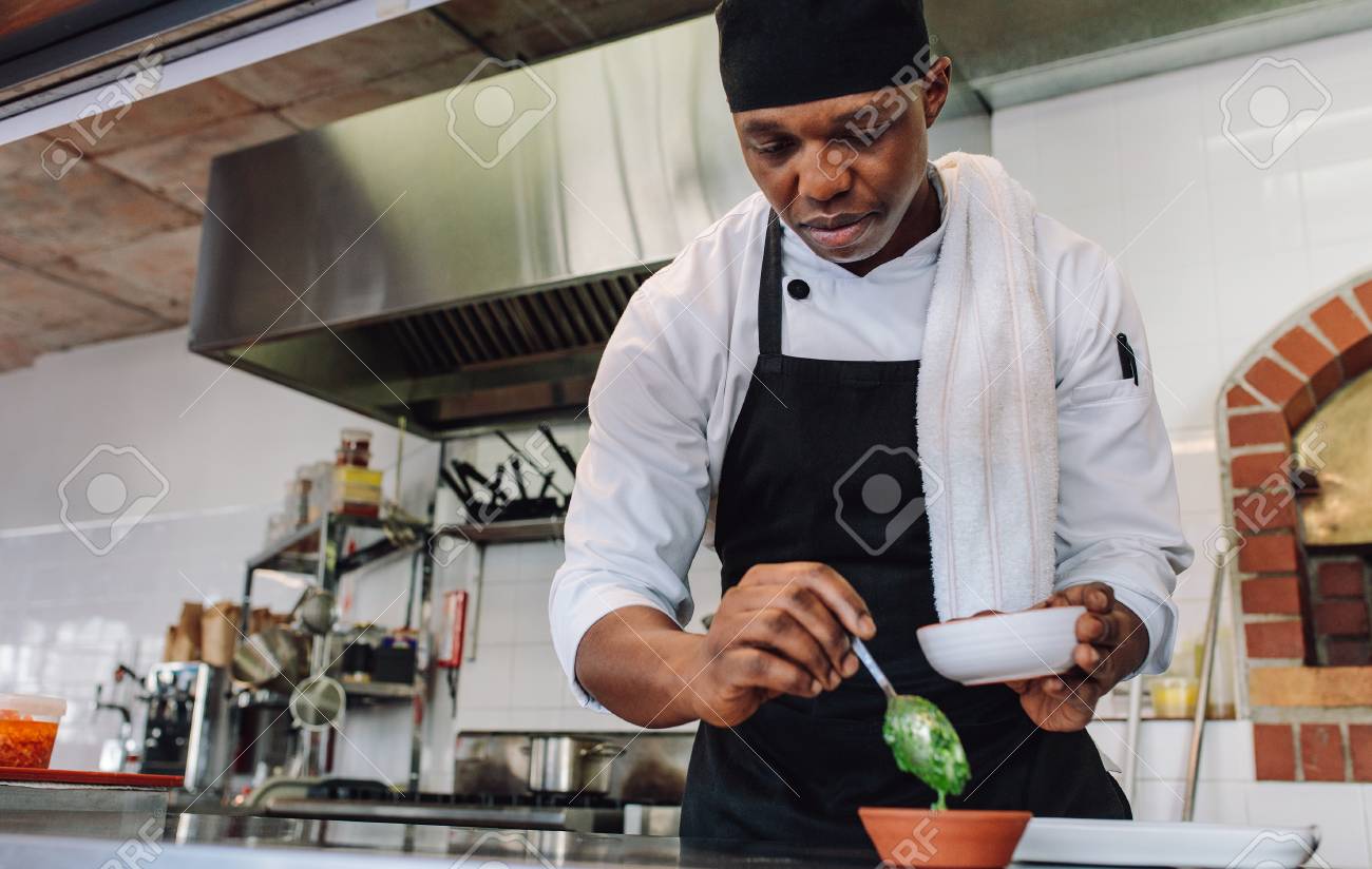 restaurant kitchen chefs man male cook preparing sauce at restaurant kitchen african male gourmet chef working commercial kitchen cook preparing sauce at restaurant kitchen restaurant kitchen chefs man male cook preparing sauce at restaurant kitchen african male gourmet chef working commercial kitchen cook preparing sauce at restaurant kitchen