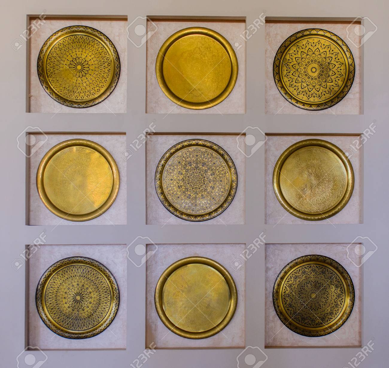 ornate switch plates ceramic interior decor of set nine ornate round brass wall plates arranged in recesses mounted decor of set nine ornate round brass wall plates ornate switch plates ceramic interior decor of set nine ornate round brass wall plates arranged in recesses mounted decor of set nine ornate round brass wall plates