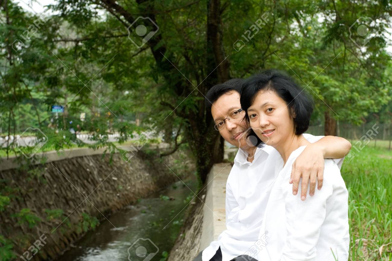 Portrait Of Lovely Asian Mature Husband