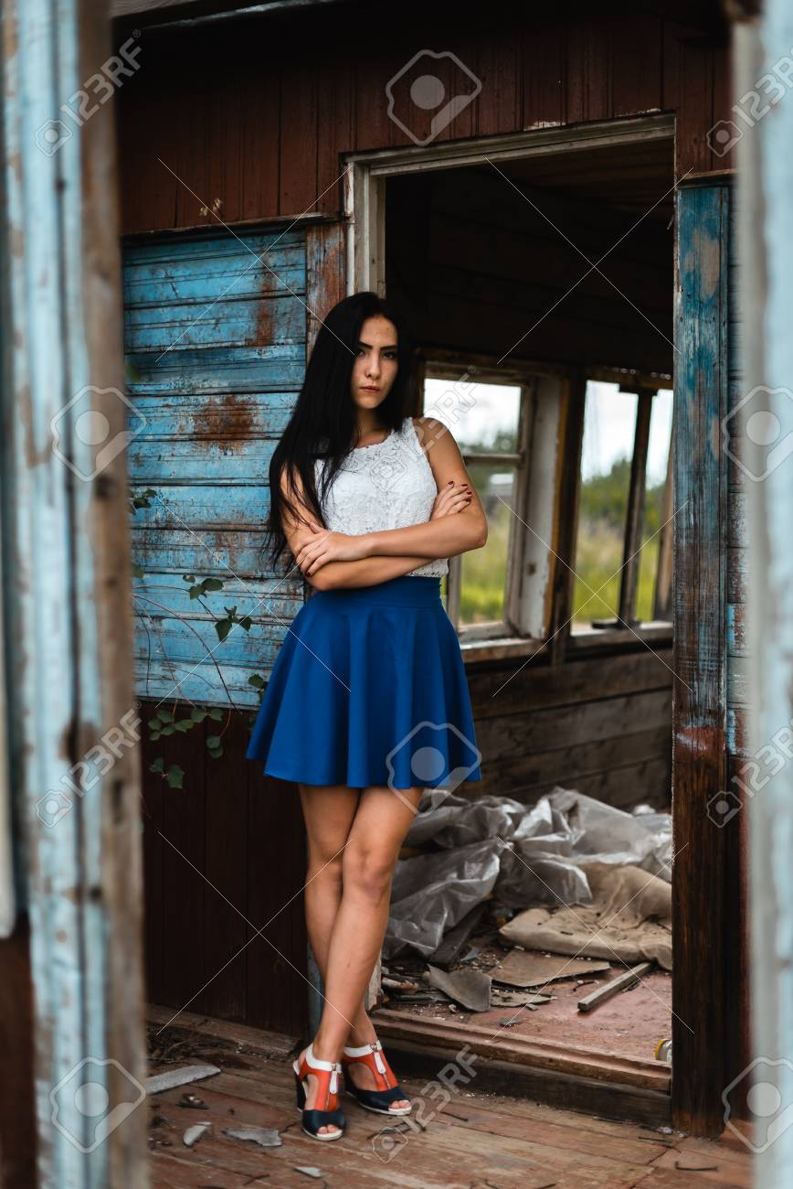 white shirt and blue skirt