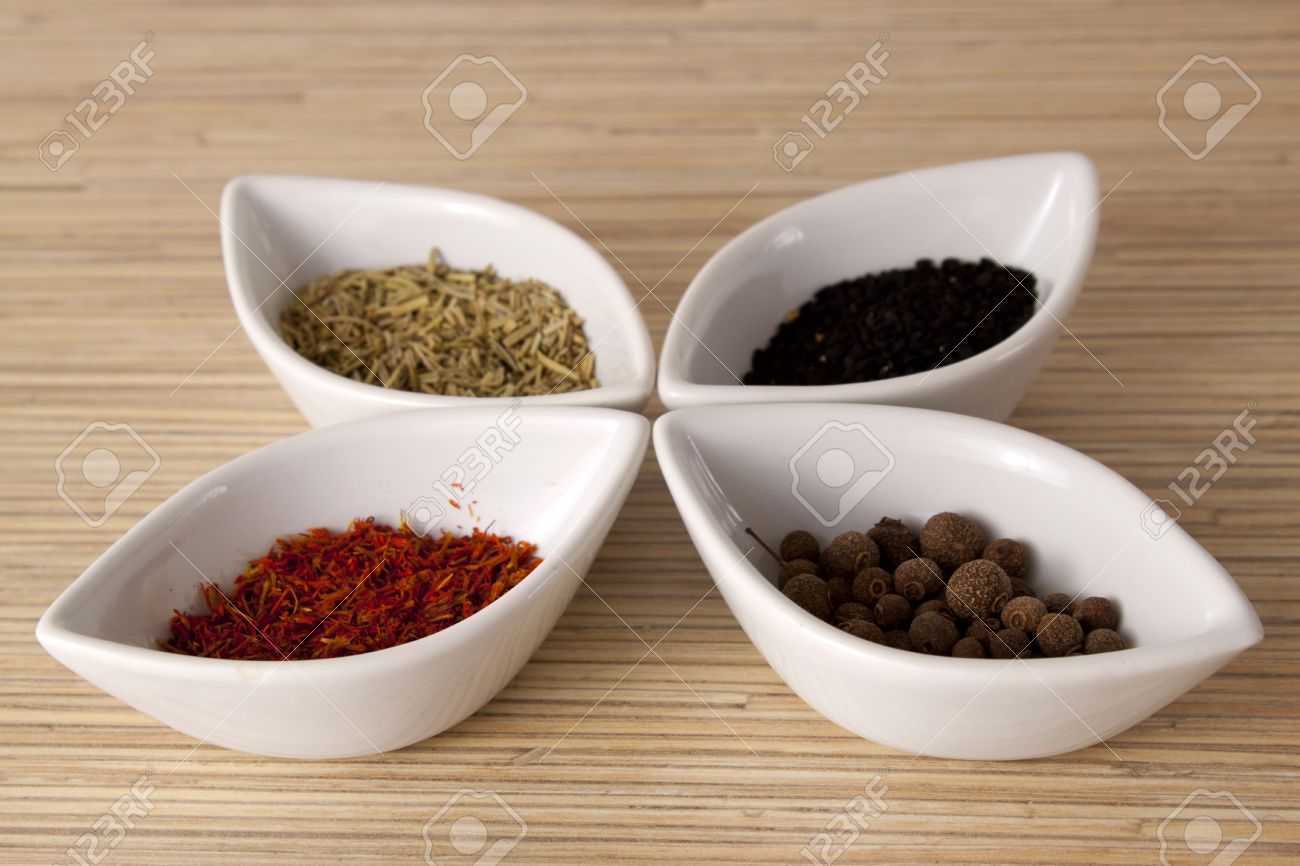 condiments in white small bowls stock photo picture and royalty