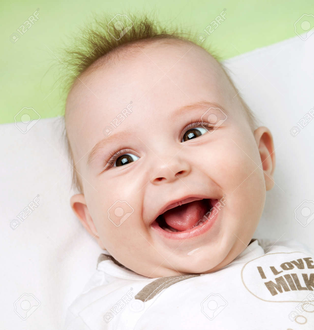 https://previews.123rf.com/images/anabgd/anabgd1401/anabgd140100028/38173886-close-up-of-adorable-6-months-old-baby-laughing.jpg
