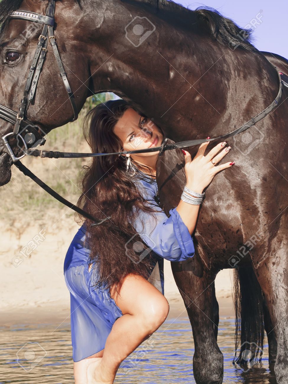 трах с конём Sexy Women With Horse Фотография, картинки, изображения и сток-фотография  без роялти. Image 10348489