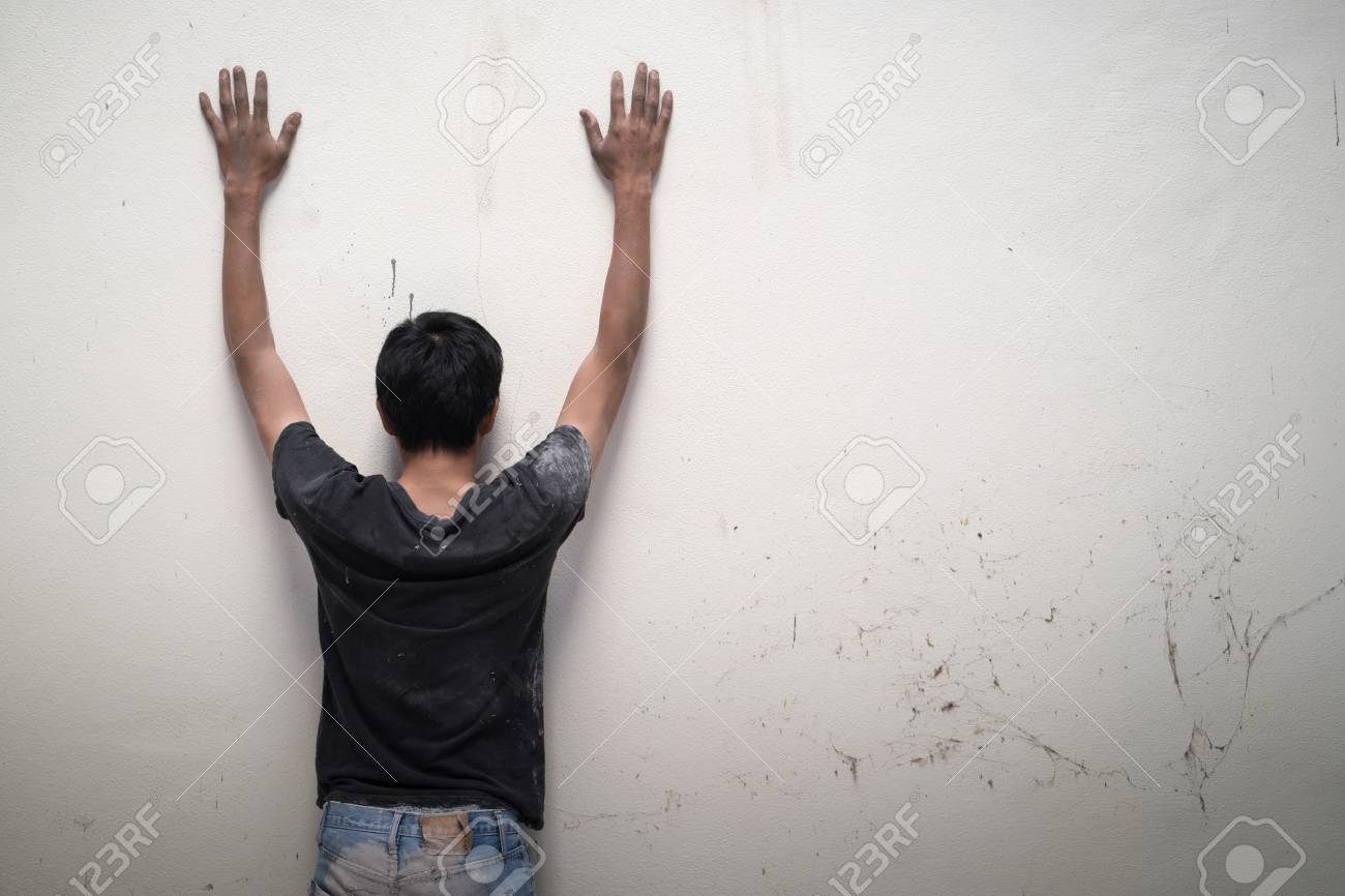 Hopeless Man Show Hands Up Facing The Wall Stock Photo Picture