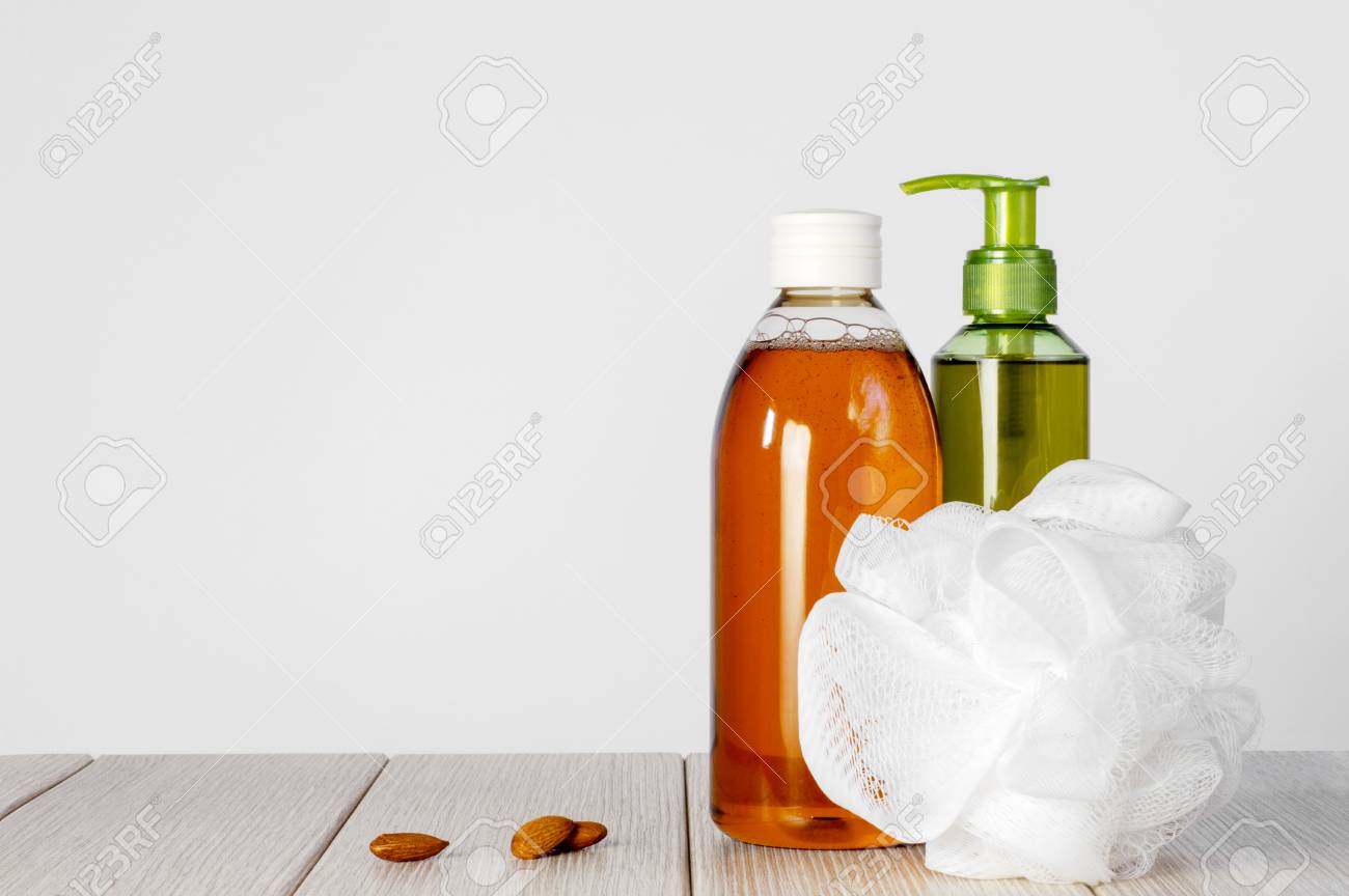 Composition with plastic bottles and mesh shower sponge for body care and beauty products - 112033055 Composition with plastic bottles and mesh shower sponge for body care and beauty products - 112033055