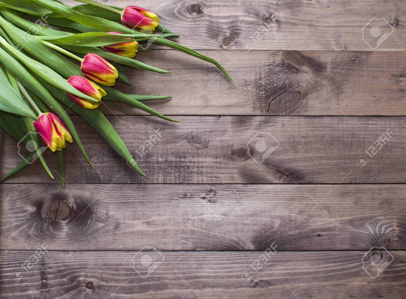 Spring Easter Bouquet Of Tulip Flowers On Wooden Background Flat