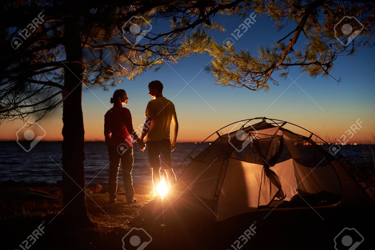 Night Camping At Lake Silhouettes Of Tourist Couple Boy And Stock Photo Picture And Royalty Free Image Image Night Camping At Lake Silhouettes Of Tourist Couple Boy And Stock Photo Picture And Royalty Free Image Image