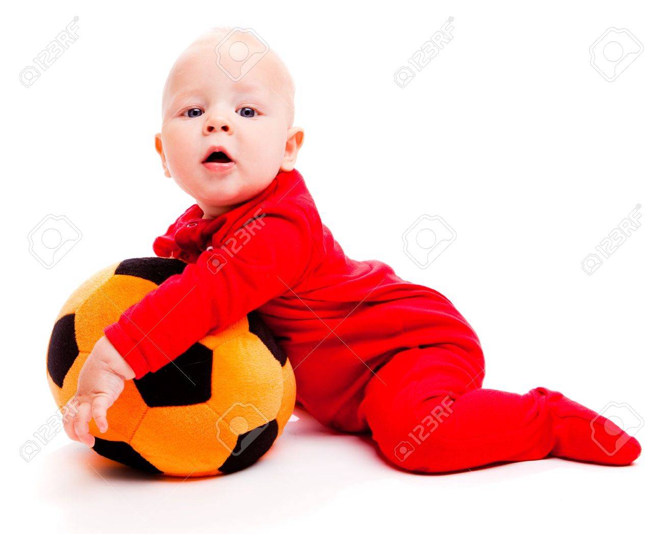 baby holding ball