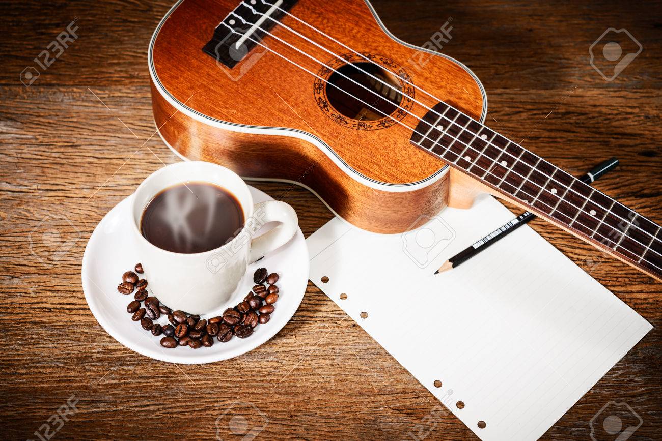 Coffee Cup And Coffee Beans And Ukulele With Papernote Stock Photo Picture And Royalty Free Image Image 24904345