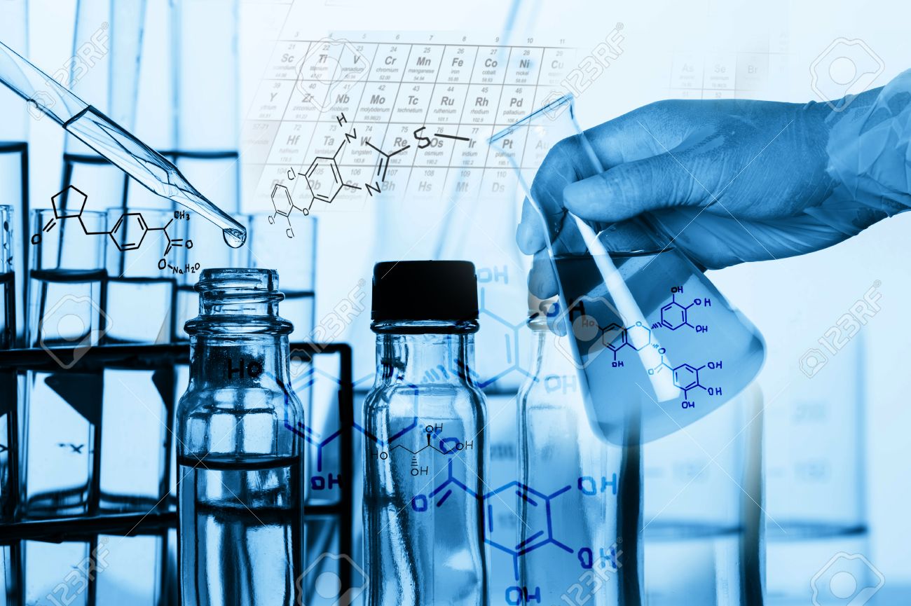 Researcher is dropping the reagent into test tube, with chemical equations background, in laboratory - 50001062 Researcher is dropping the reagent into test tube, with chemical equations background, in laboratory - 50001062