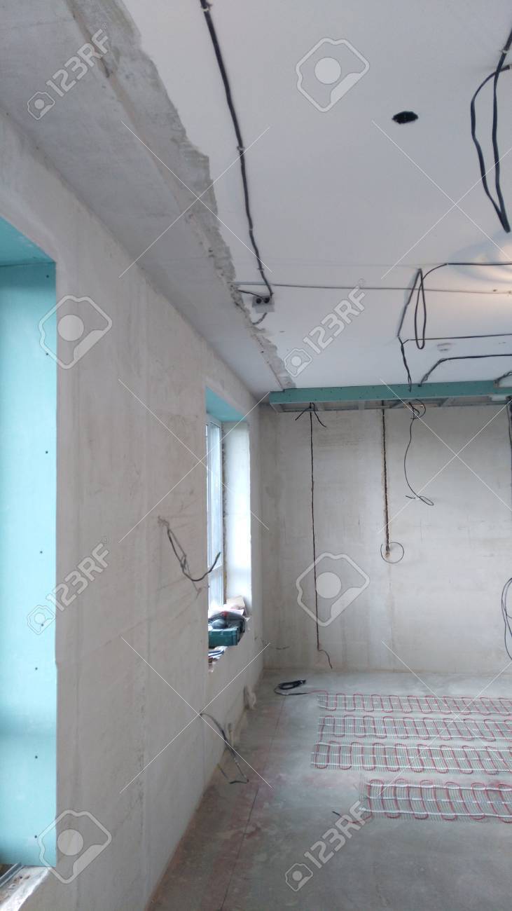 finishing works in an apartment construction site stock photo finishing works in construction