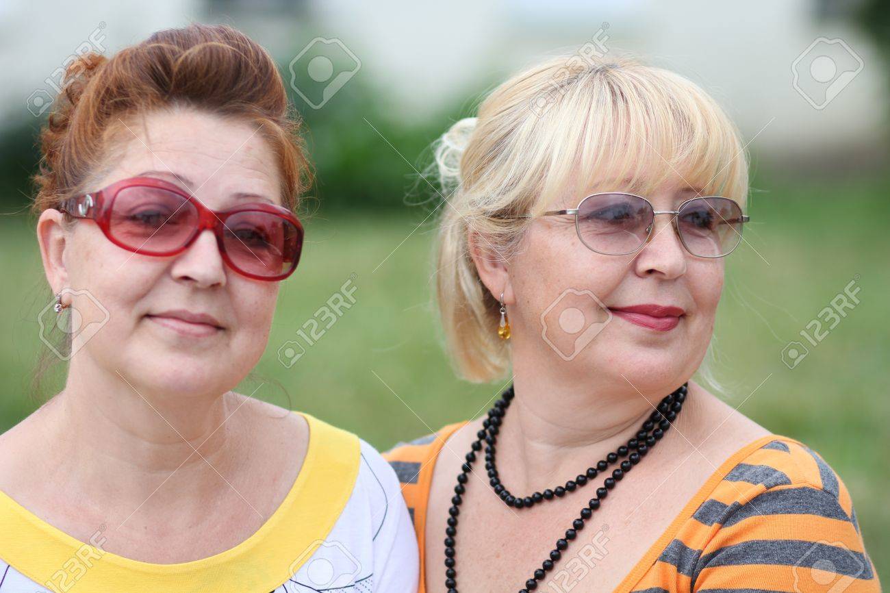Two Mature Women In Park Stock Photo