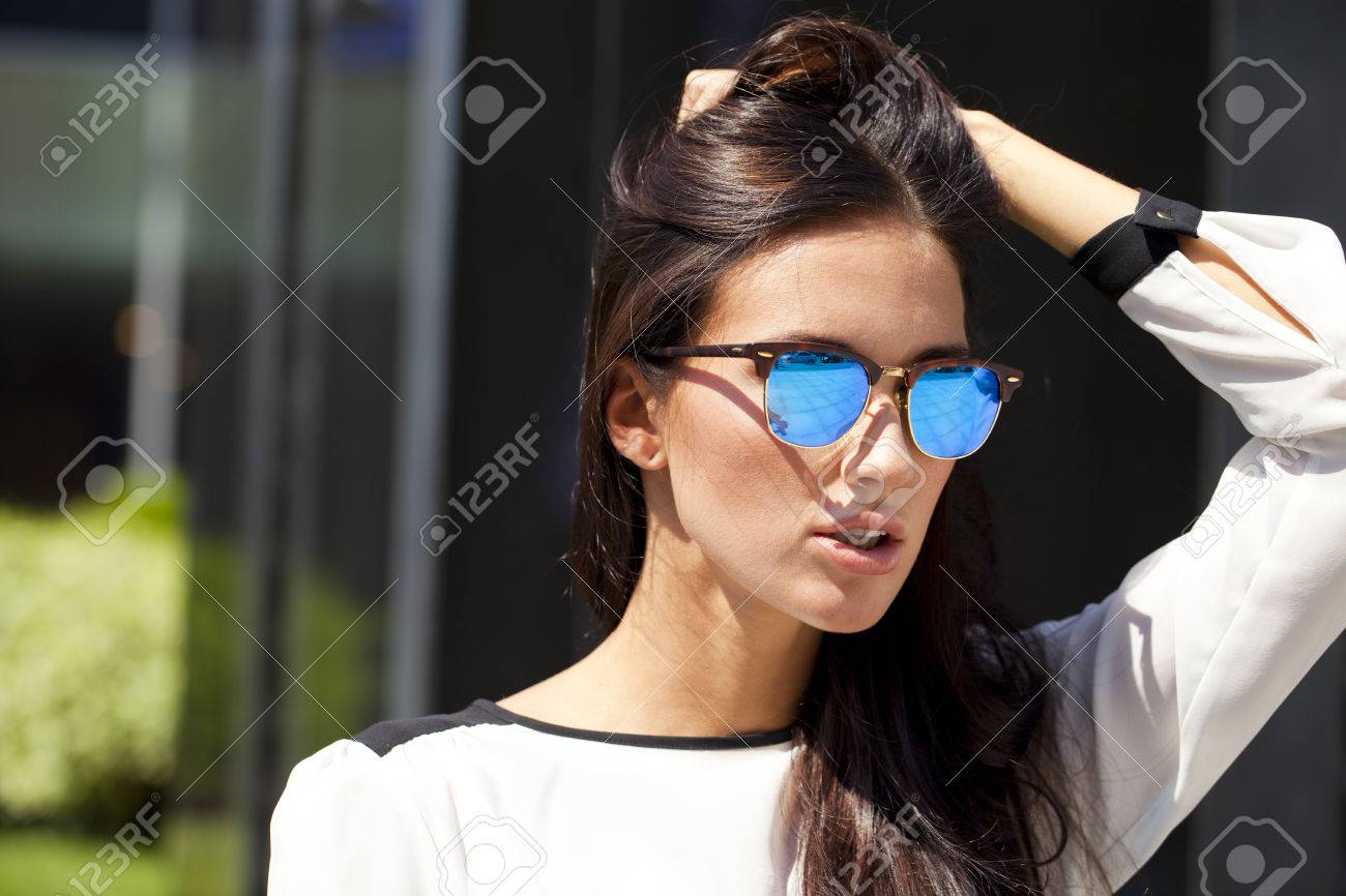 black aviator sunglasses with gold trim