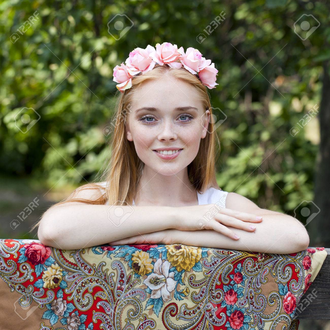 https://previews.123rf.com/images/andersonrise/andersonrise1503/andersonrise150301196/37573754-russian-beauty-woman-with-a-wreath-on-head.jpg