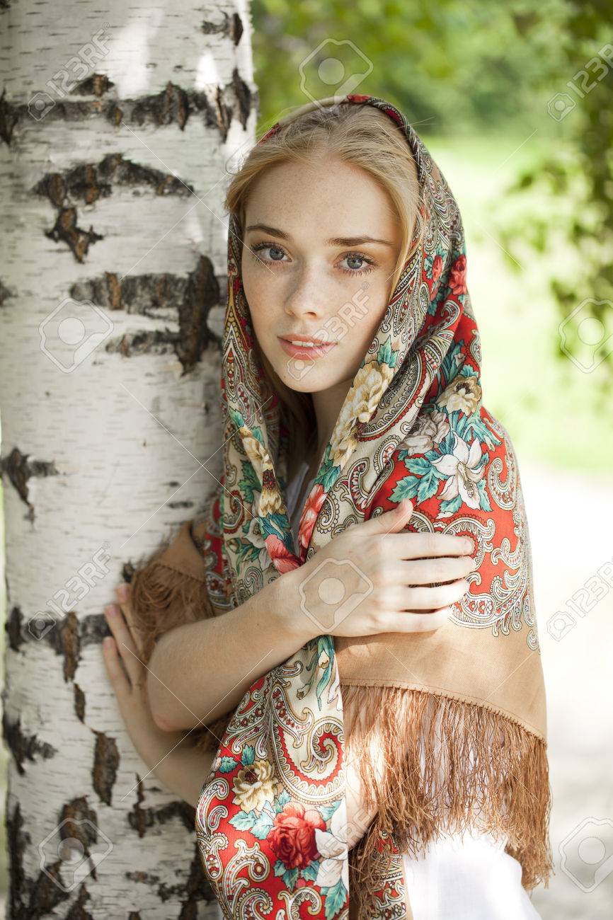 https://previews.123rf.com/images/andersonrise/andersonrise1503/andersonrise150301203/37573786-russian-beauty-woman-in-the-national-patterned-scarf.jpg