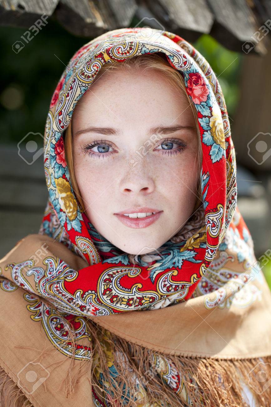 https://previews.123rf.com/images/andersonrise/andersonrise1503/andersonrise150301244/37574442-russian-beauty-woman-in-the-national-patterned-scarf.jpg