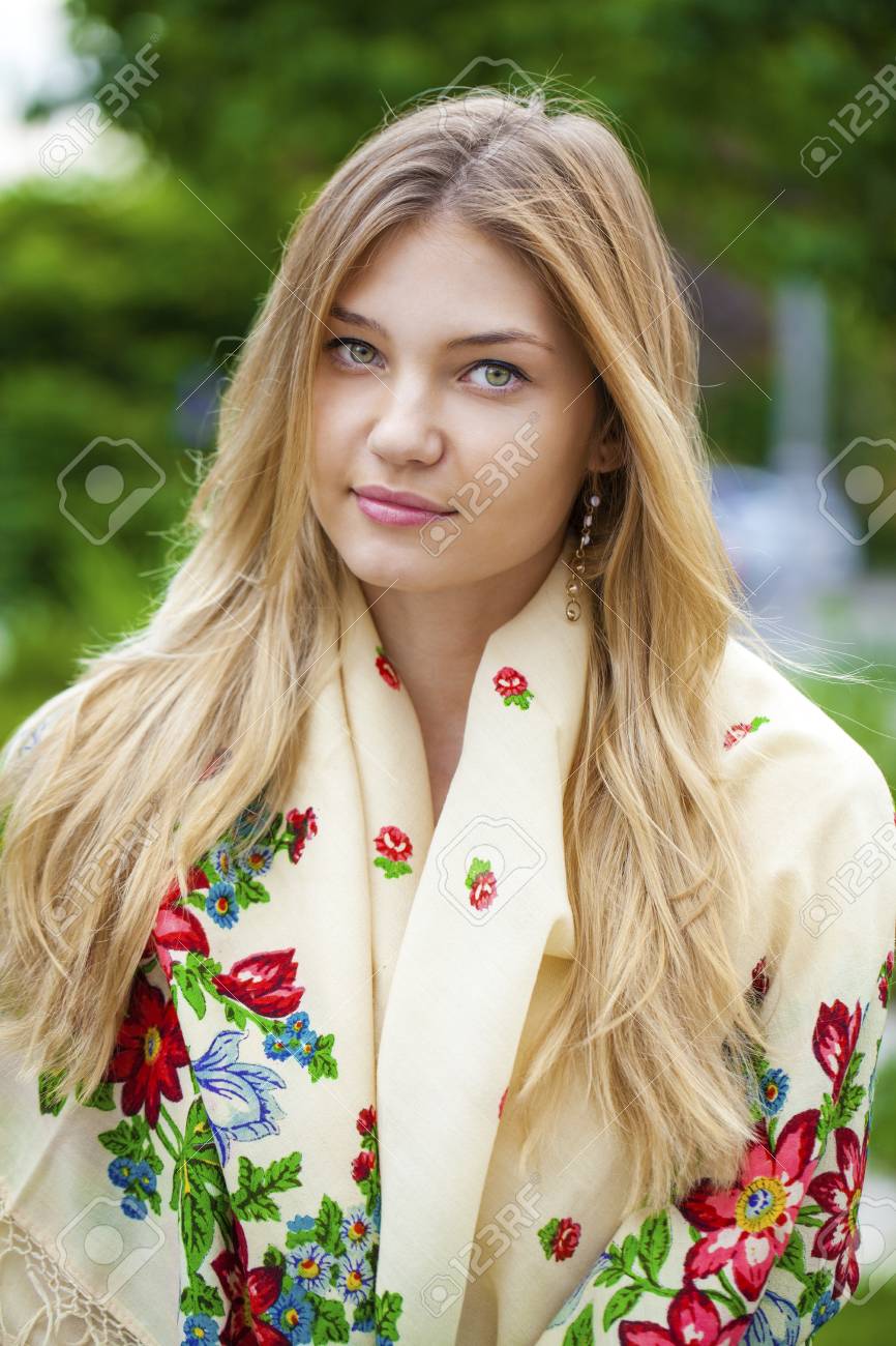 https://previews.123rf.com/images/andersonrise/andersonrise1606/andersonrise160600058/58833057-russian-beauty-woman-in-the-national-patterned-scarf.jpg