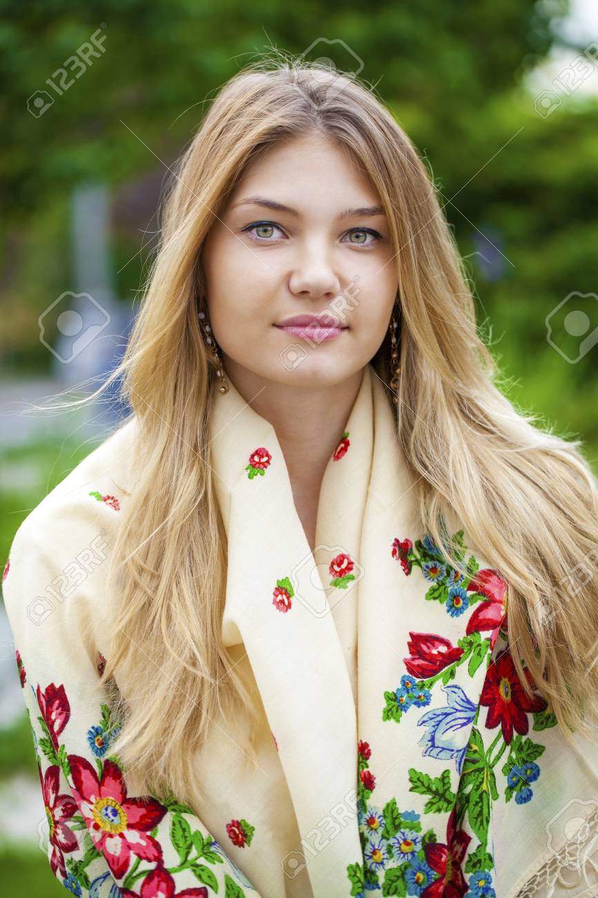 https://previews.123rf.com/images/andersonrise/andersonrise1606/andersonrise160600697/59013570-russian-beauty-woman-in-the-national-patterned-scarf.jpg