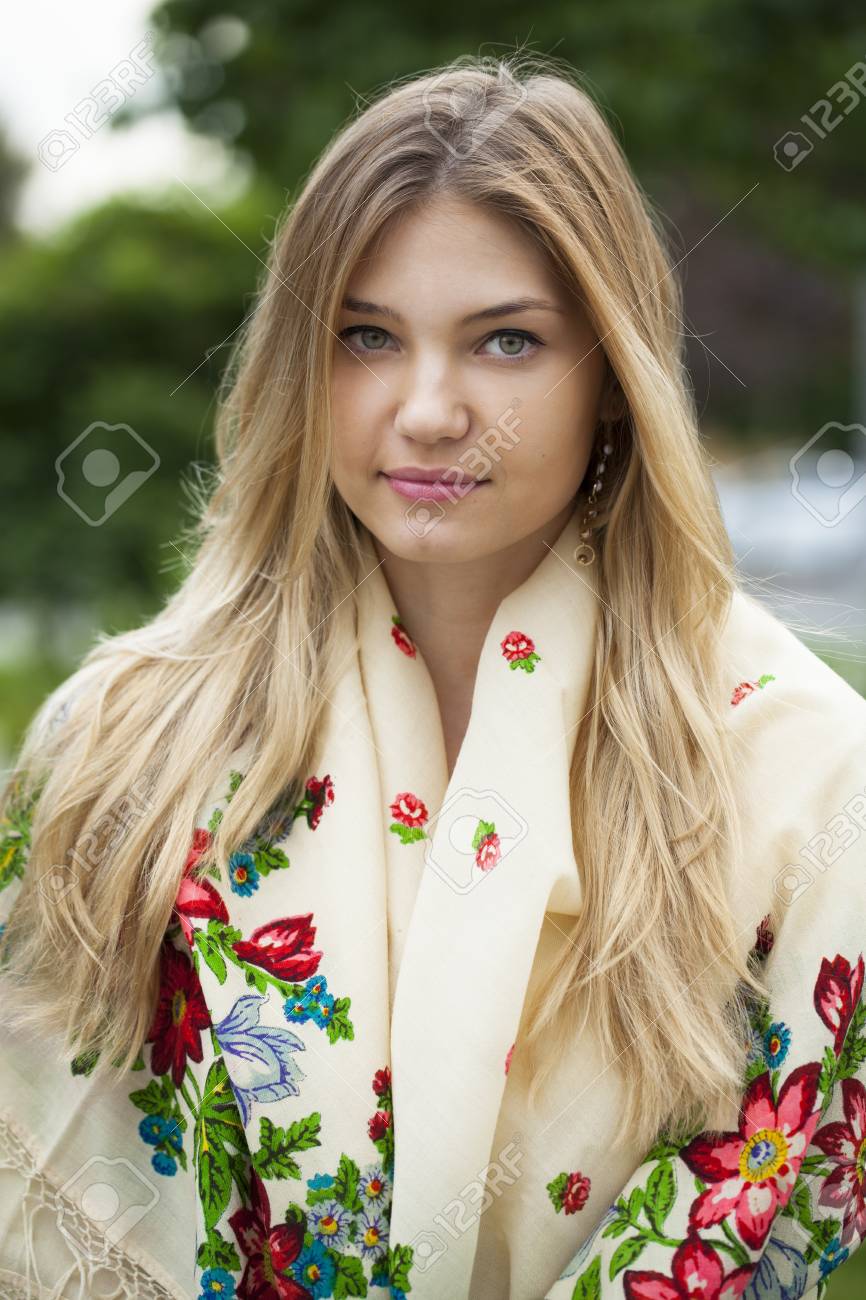 https://previews.123rf.com/images/andersonrise/andersonrise1607/andersonrise160700856/59956126-russian-beauty-woman-in-the-national-patterned-scarf.jpg