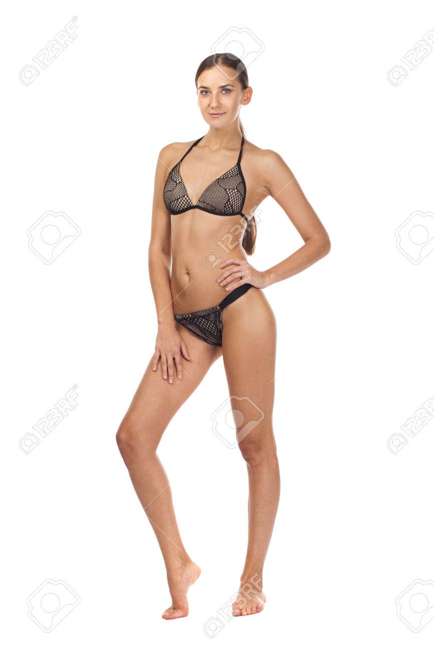 全長ビキニ、白い背景で隔離のスリムな日焼け美女の写真素材・画像素材 Image 64492718