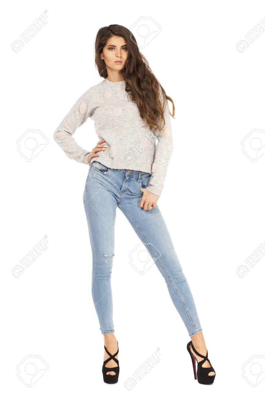 gray sweater and jeans