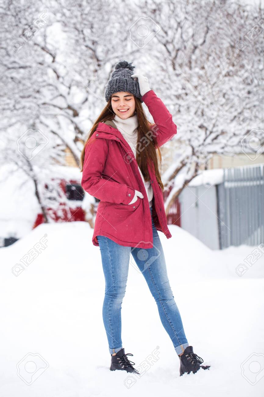 red jacket with blue jeans