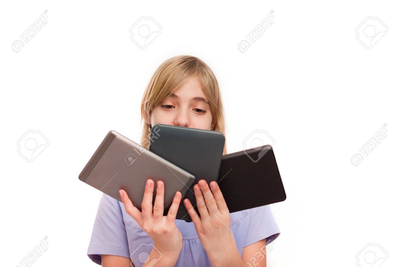 ebook readers and tablets young girl holding different types
