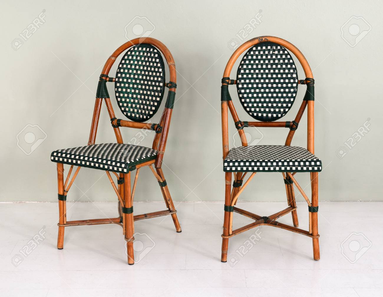 Pair Of Bamboo Chairs With Polka Dot Upholstery In Modern Room Stock Photo Picture And Royalty Free Image Image
