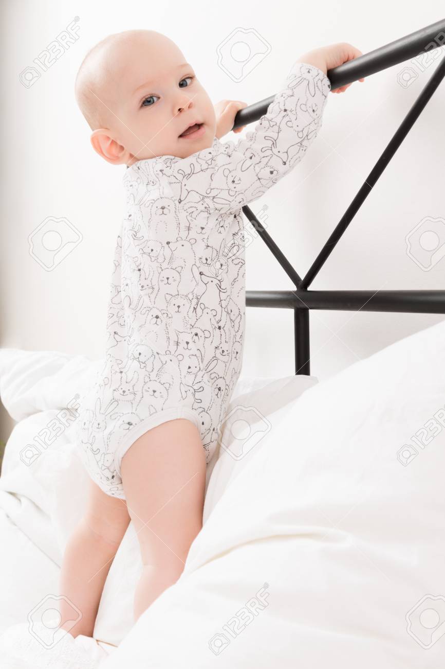help baby stand up