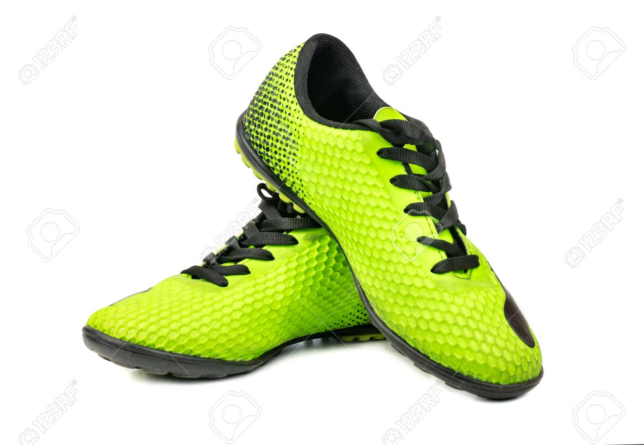 green and white football boots