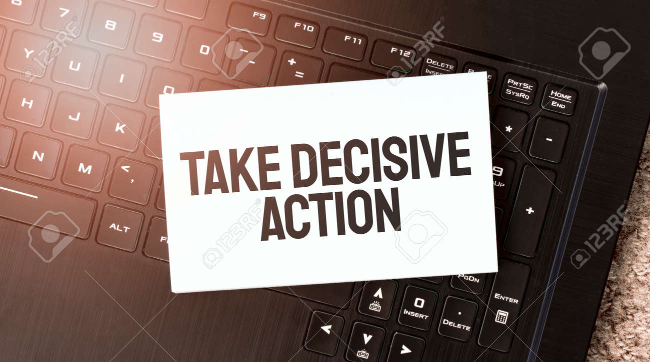 White Paper Sheet With Text Take Decisive Action On The Black Laptop Stock Photo Picture And Royalty Free Image Image 159829338