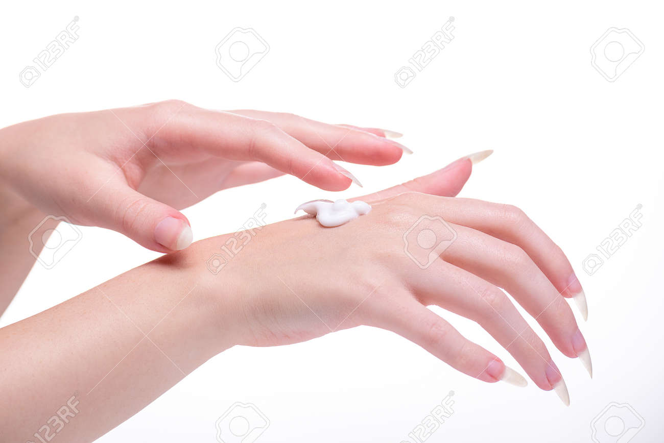 Moisturizer female hand. Beautiful hands of young woman white background. Apply cream on the skin hands. Applying moisturizer for the hands young girl. Beautiful hands girl on white background. - 145481326 Moisturizer female hand. Beautiful hands of young woman white background. Apply cream on the skin hands. Applying moisturizer for the hands young girl. Beautiful hands girl on white background. - 145481326