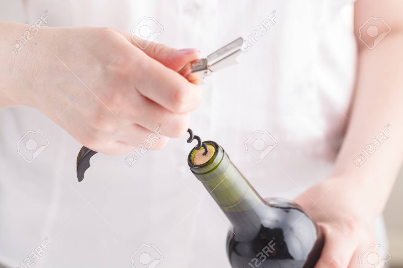 Opening Wine Bottle With A Corkscrew Stock Photo Picture And Royalty Free Image Image 101677069