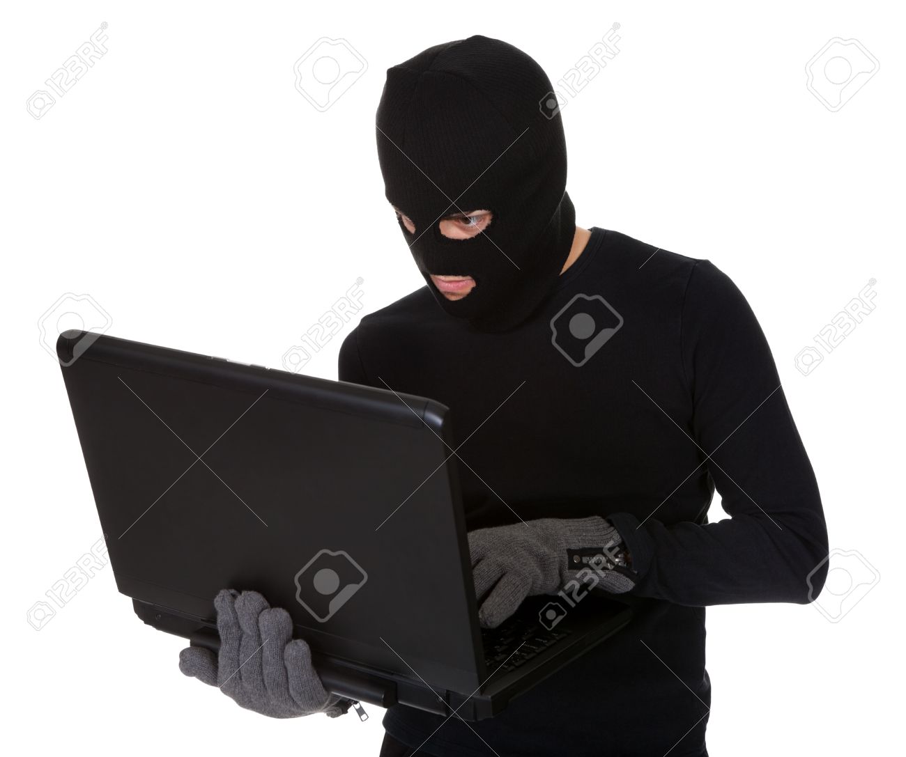 17384576-thief-in-disguise-stealing-data-from-computer.jpg