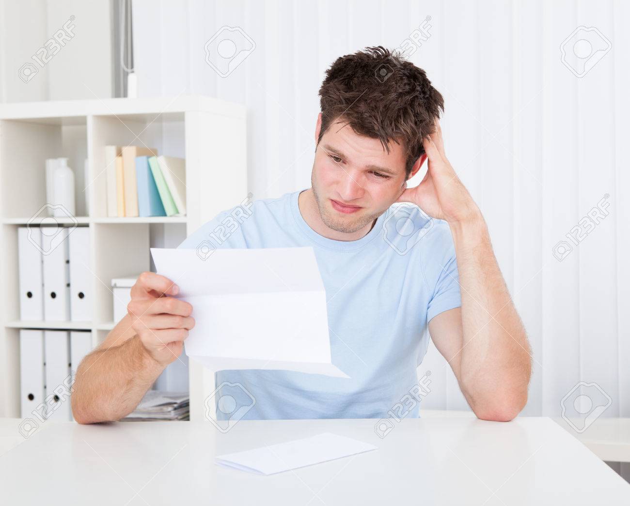 Man Reading Paper