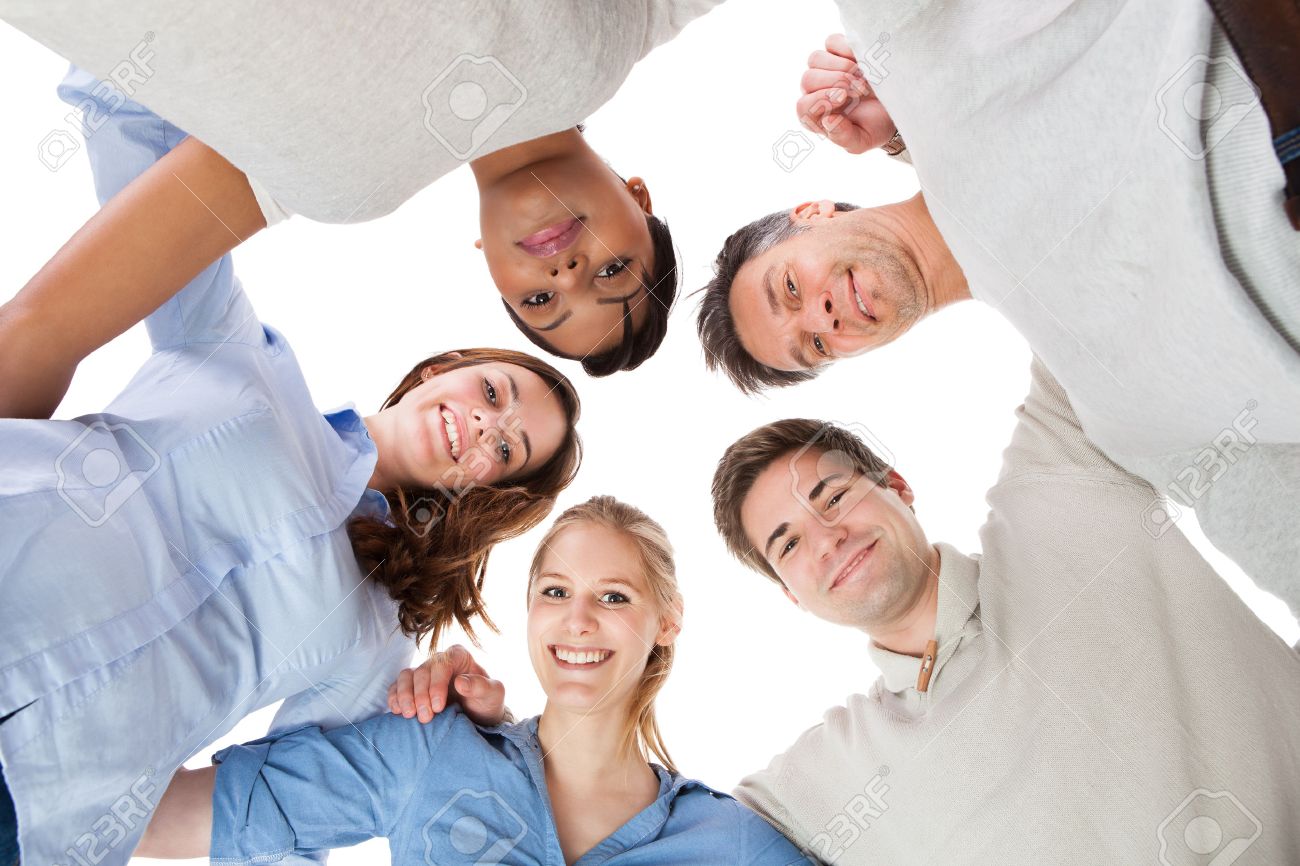 Happy Group Of People In Circle Looking Down Over White Background Stock Photo Picture And Royalty Free Image Image 25538618