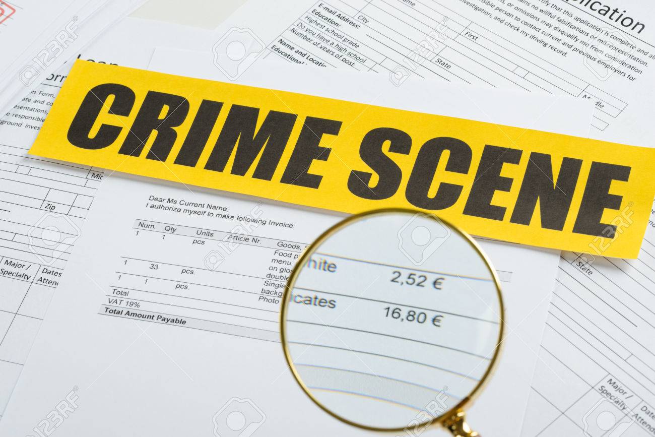 Close Up Of Magnifying Glass Over Documents With Crime Scene Yellow Tape Stock Photo Picture And Royalty Free Image Image 35461775
