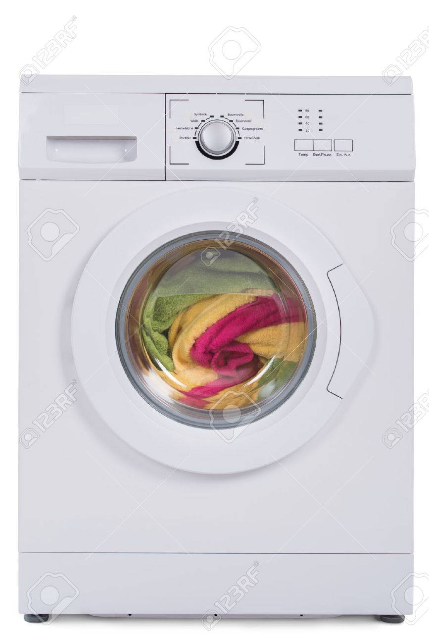 Washing machine full of dirty clothes isolated against blue background - 51726146 Washing machine full of dirty clothes isolated against blue background - 51726146