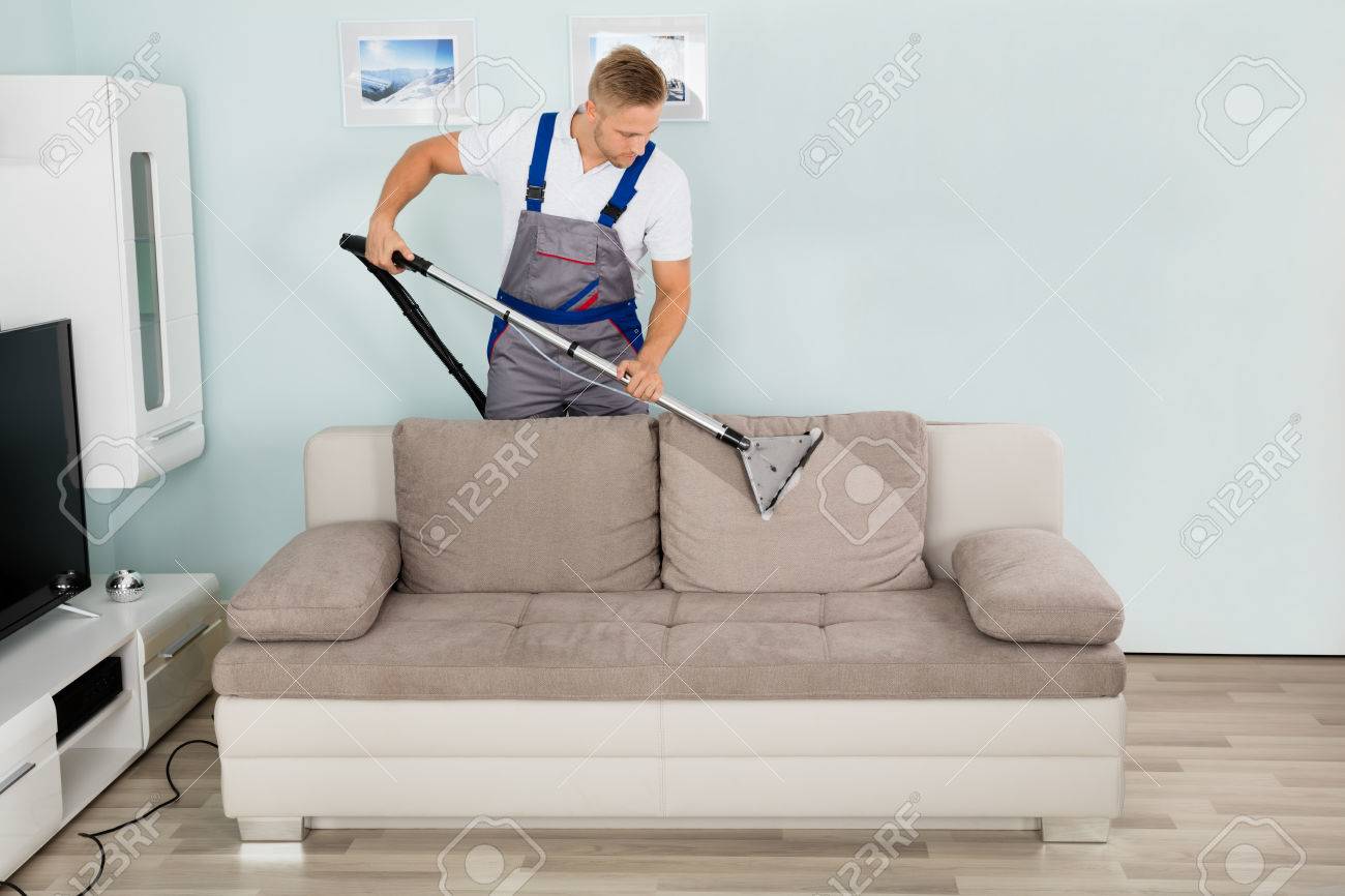couch vacuum cleaner furniture stock photo young male worker cleaning sofa with vacuum cleaner couch vacuum cleaner furniture stock photo young male worker cleaning sofa with vacuum cleaner