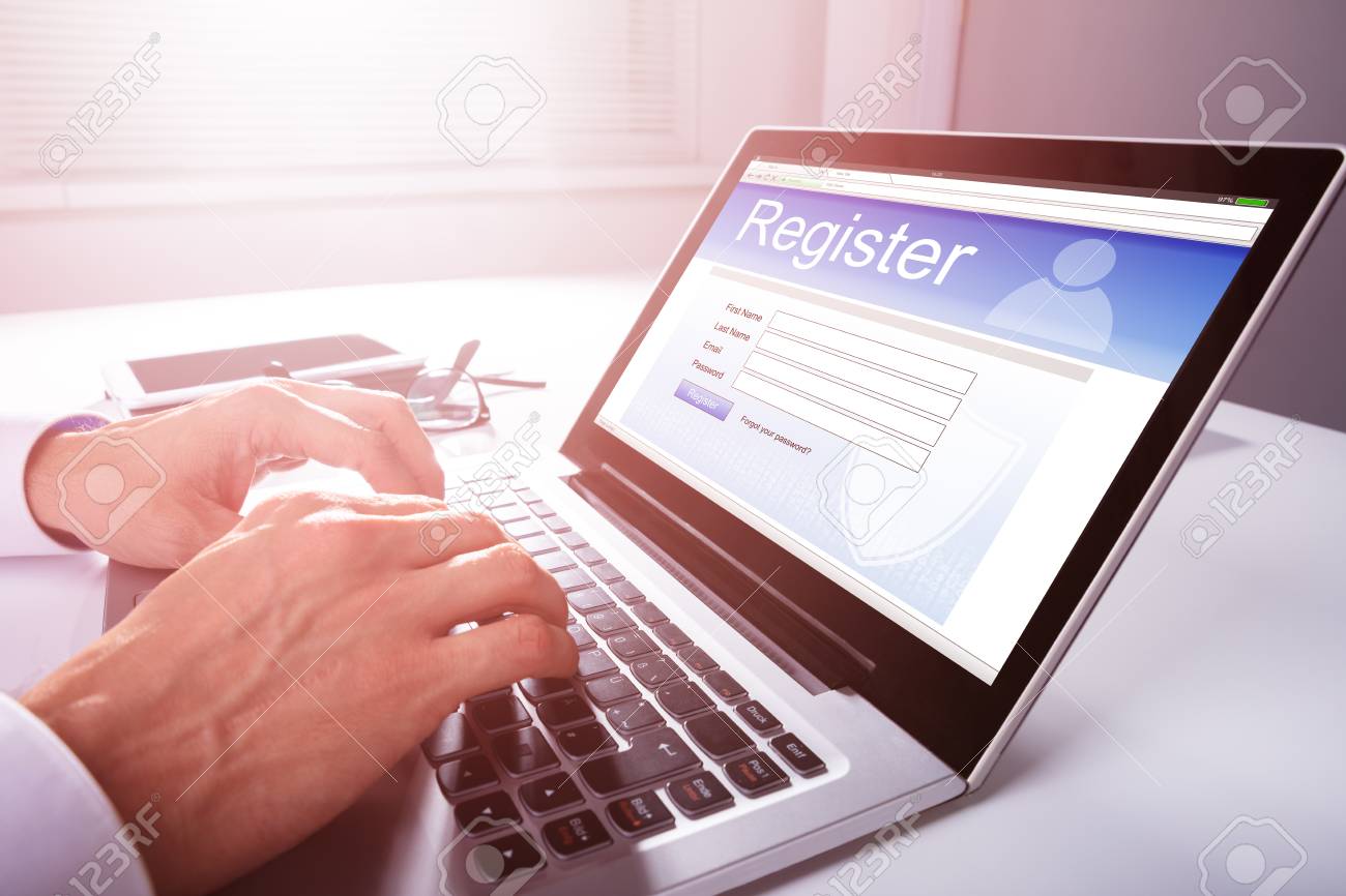 https://previews.123rf.com/images/andreypopov/andreypopov1808/andreypopov180800521/106206983-businessman-s-hand-filling-online-registration-form-on-laptop.jpg