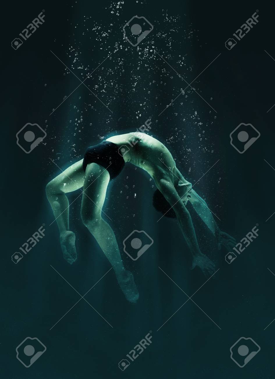 Man Floats Underwater. Horrible Dream Stock Photo, Picture And Royalty Free  Image. Image 103099642.