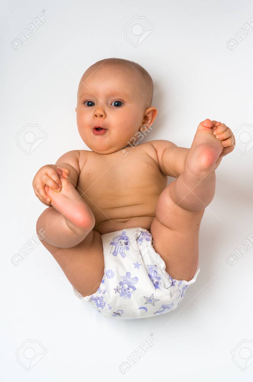Cute Baby In Diaper Lying On Back Isolated On White Background Stock