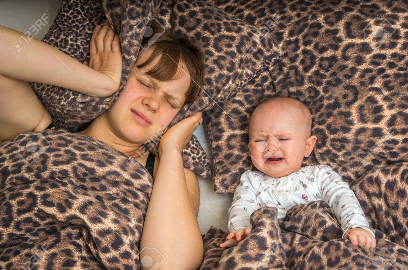 Tired Mother Can T To Sleep Because Her Baby Won T Stop Crying Stock Photo Picture And Royalty Free Image Image 74822540