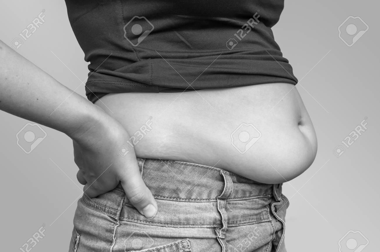 Overweight Woman In Jeans And Fat On picture