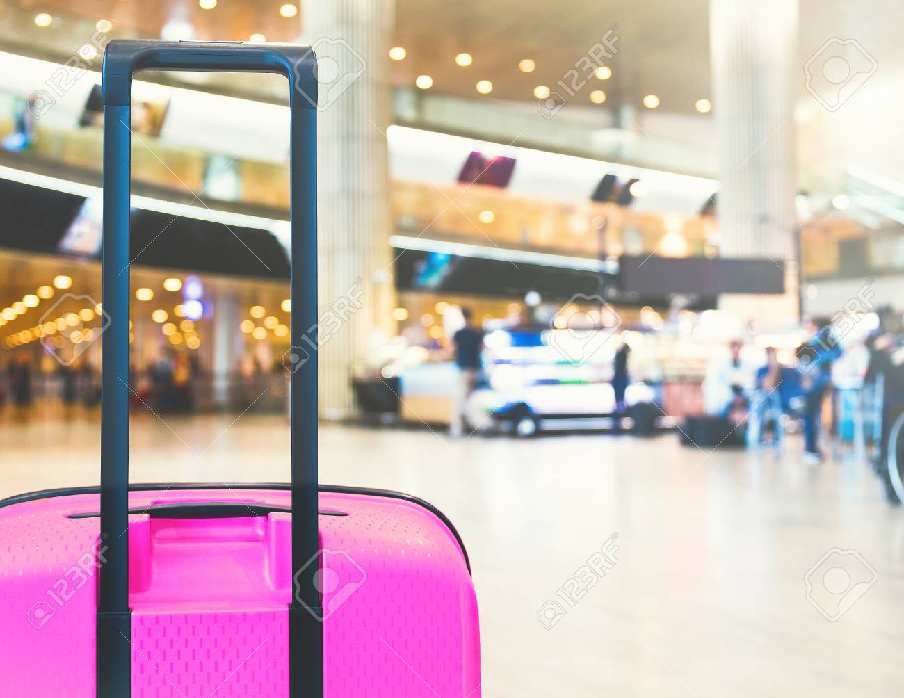 bright pink suitcase